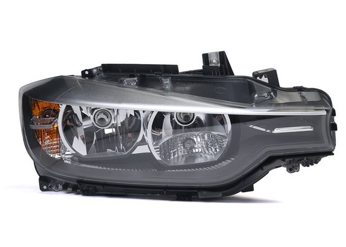 BMW Headlight Assembly - Passenger Side (Halogen) 63117338710 - ZKW 7212200002